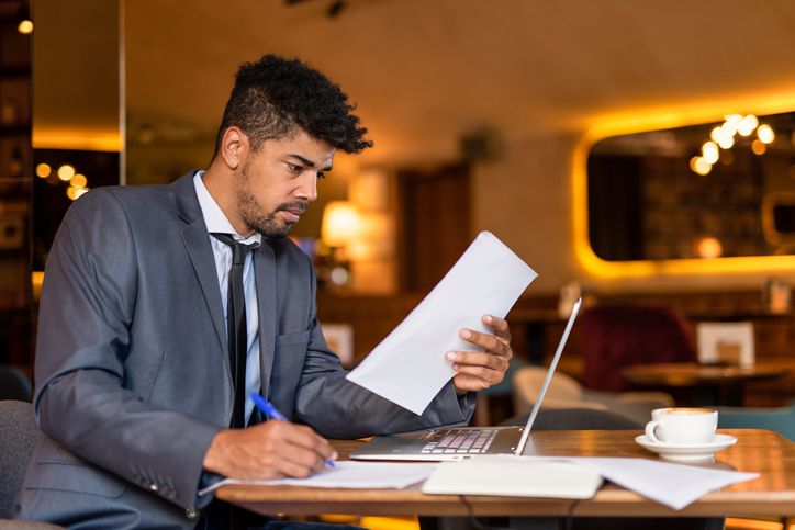 Man looking at documents