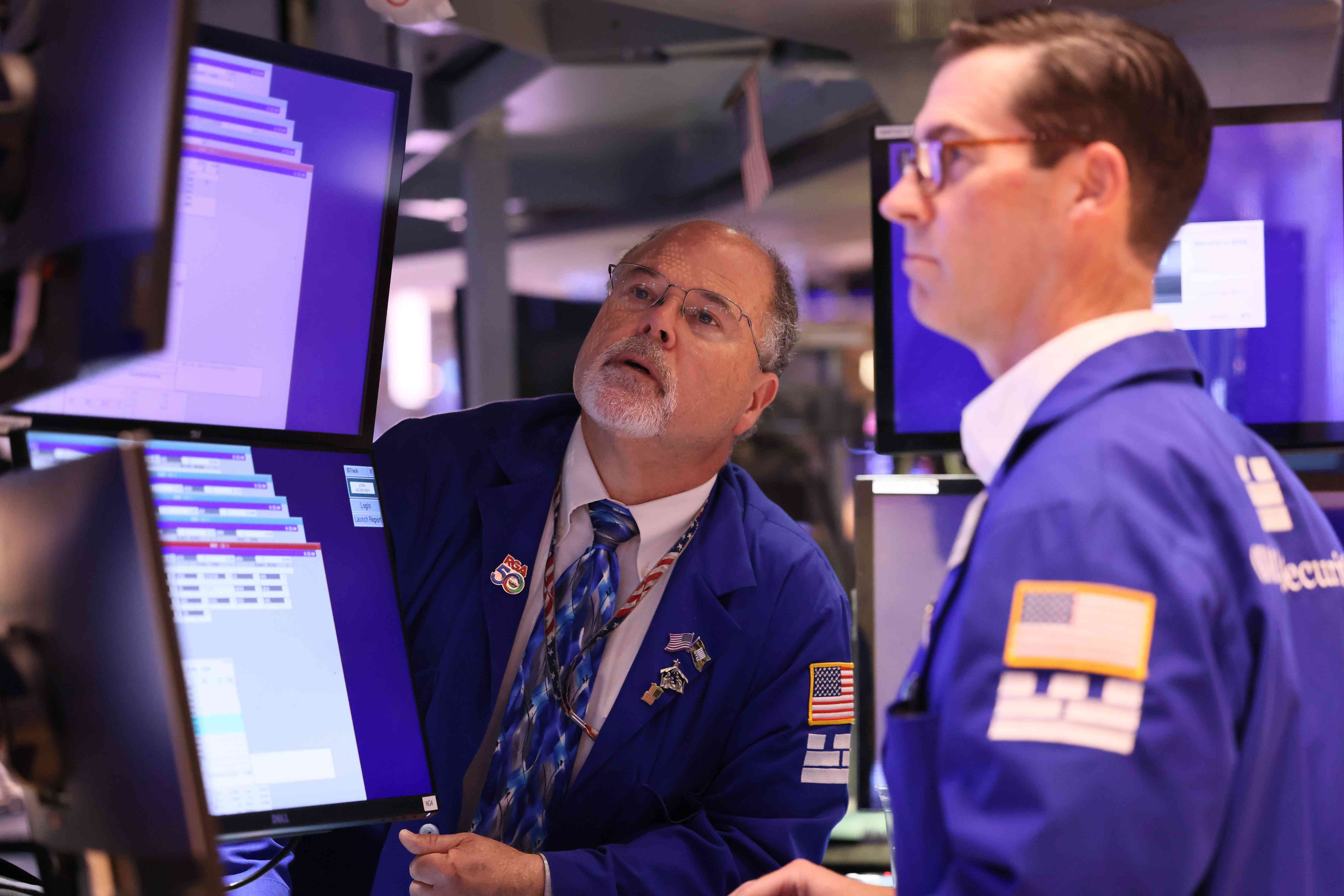 Traders on the floor of the stock exchange